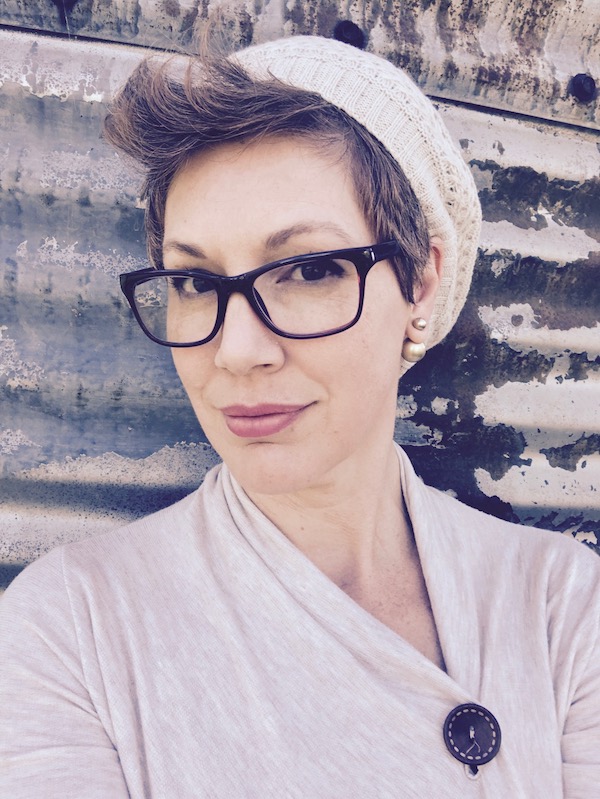 woman in a knit cap with glasses